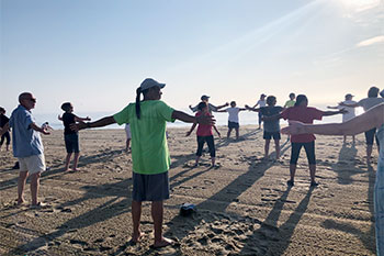 Qigong class on the beach